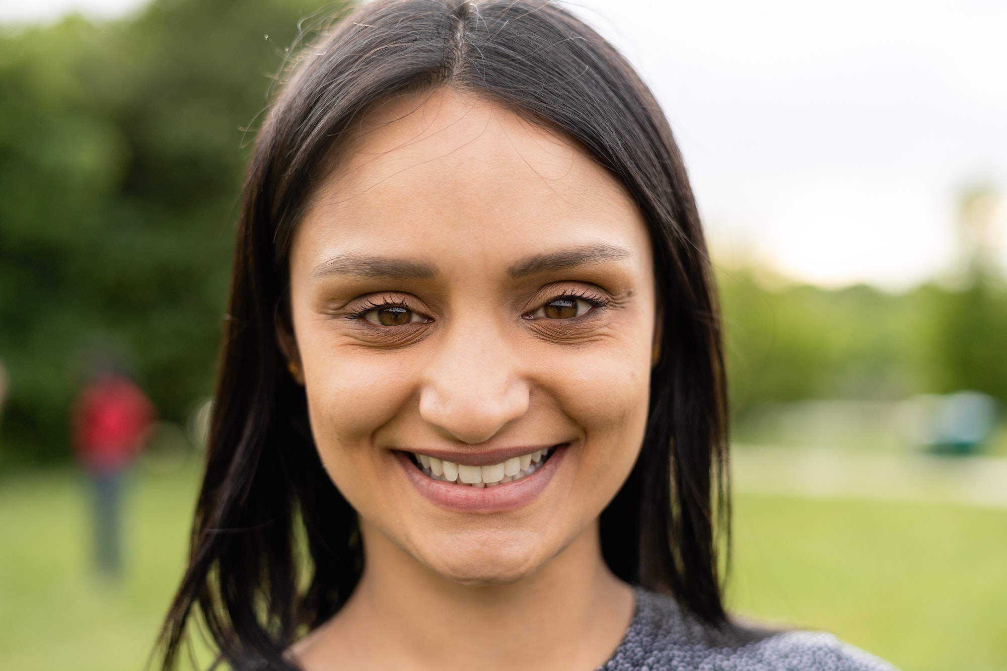 Confident indian girl looking at camera and smiling