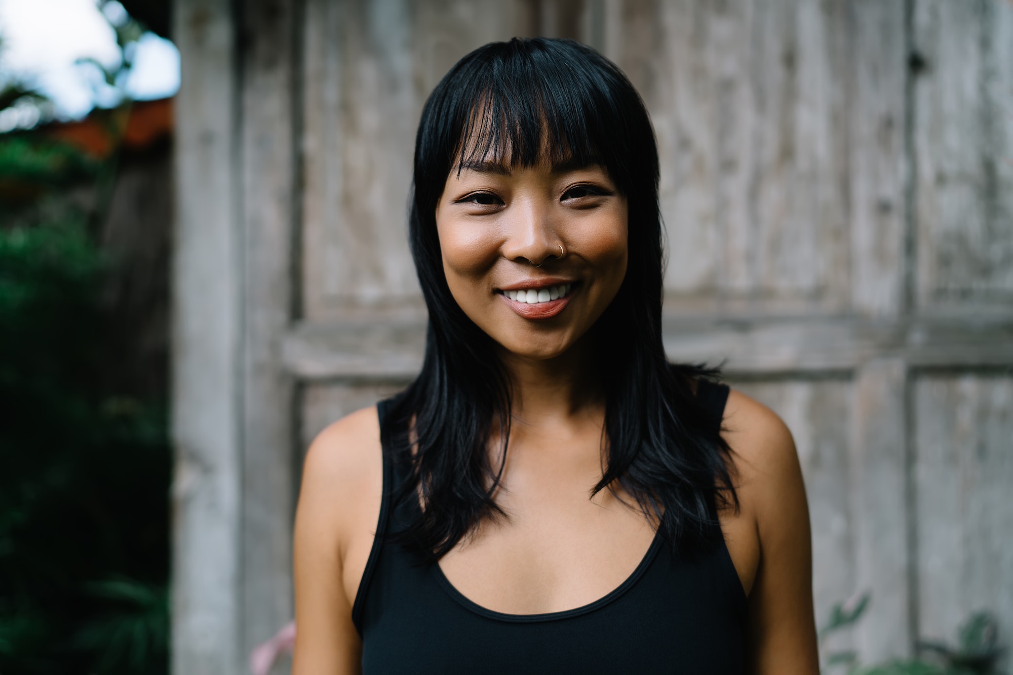 Portrait of smiling asian girl looking at camera